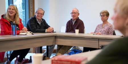 People sitting around a conference table