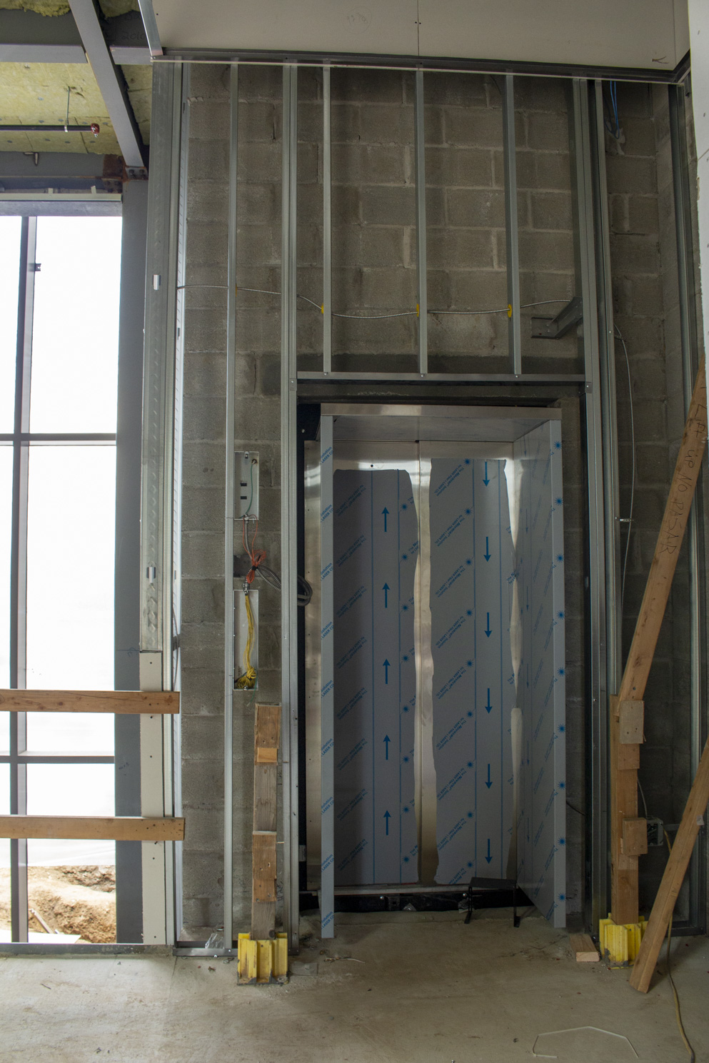 New elevator in the Atrium. Outside area of new atrium.